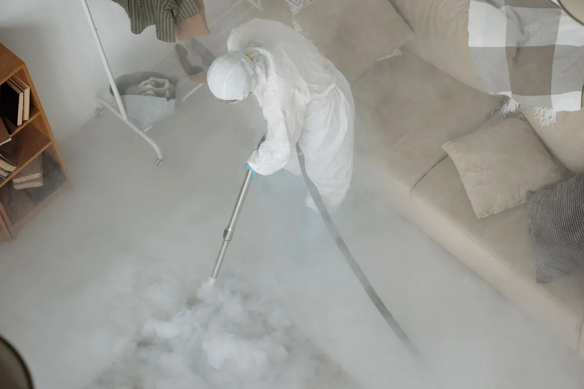 Biohazard cleanup technician in protective equipment, Underwood-Petersville, AL